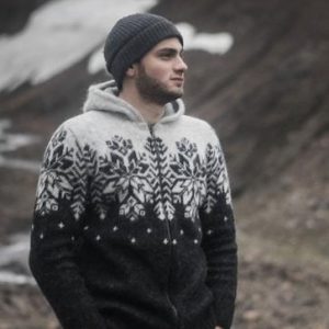 "Ás" hooded cardigan black, black hoodie with white pattern and a full length zipper. Made from Icelandic wool