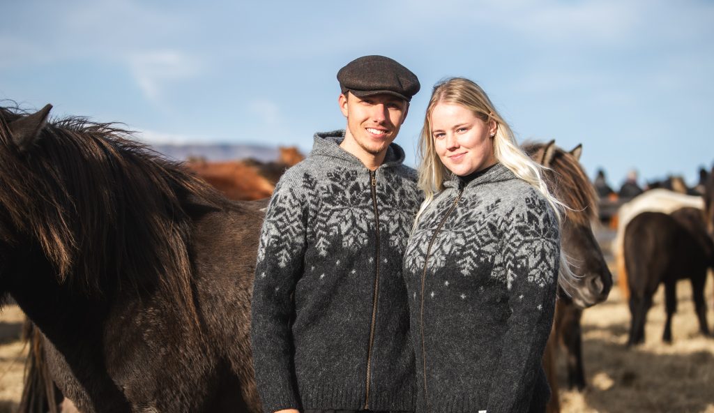 "Ás" hooded cardigan dark gray, black cardigan with gray pattern. hood and full-length zipper made from Icelandic wool