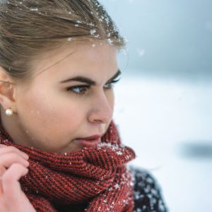 red loop scarf with blacks tripes made from Icelandic wool