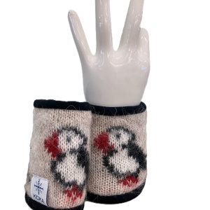Beige puffin wrist warmers made from Icelandic wool, lined with black fleece
