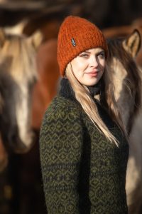 Half-zip sweater with all over pattern in moss green and charcoal black. Made from icelandic wool, made in Iceland - unisex fit