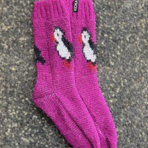Pink puffin socks with two puffins front and back, made from Icelandic wool, made in Iceland