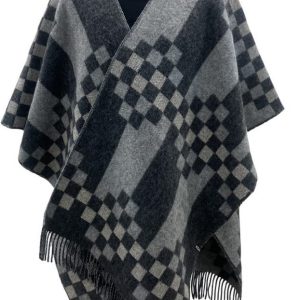KIDKA ReCover Basalt is a woven warm, sturdy and elegant wool poncho. Easy to wear & the soft, durable material keeps you warm on cooler days. Icelandic wool & Merino